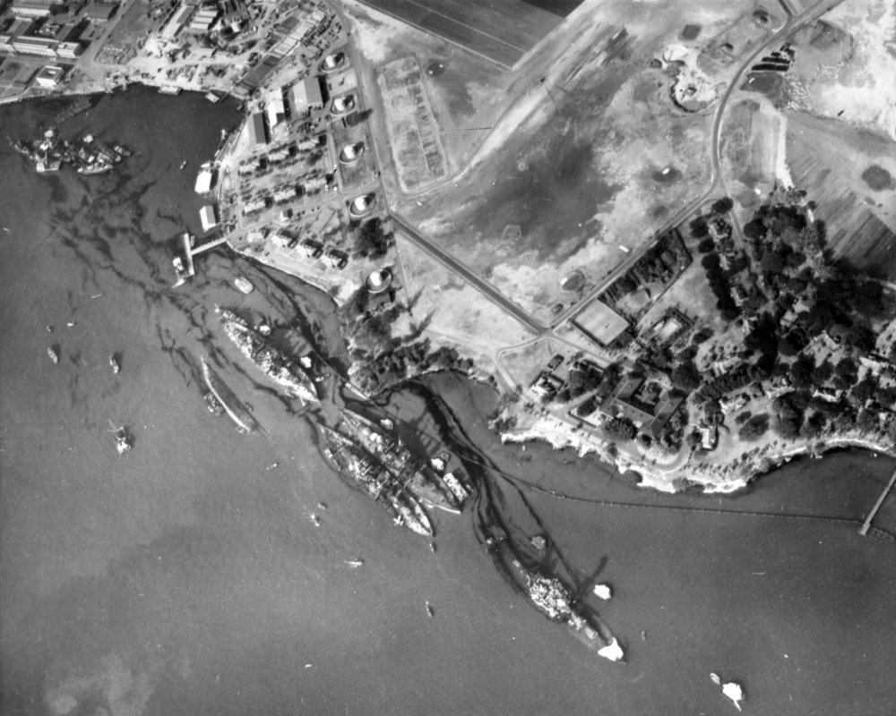 Of the battleships damaged or sunk at Pearl Harbor, how many went on to serve later in the war after being raised and/or repaired?