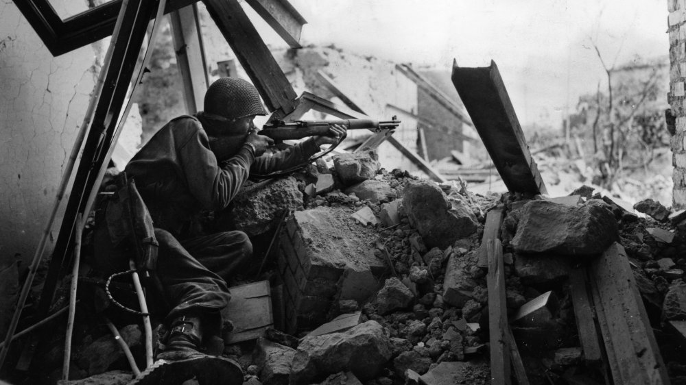 What type of Allied regiment lost two of its three battalions during the Battle of Cisterna in Italy?