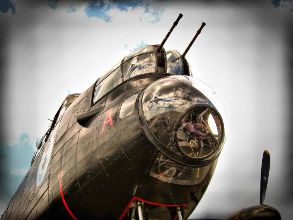 In what way was the British Avro Lancaster heavy bomber significantly better than the American B-17 Flying Fortress?
