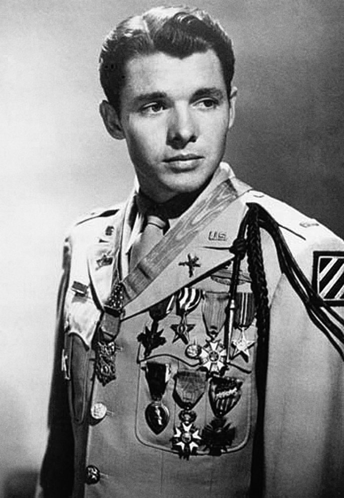 For what action did Audie Murphy, often described as the most decorated American soldiers of World War II, receive the Medal of Honor?