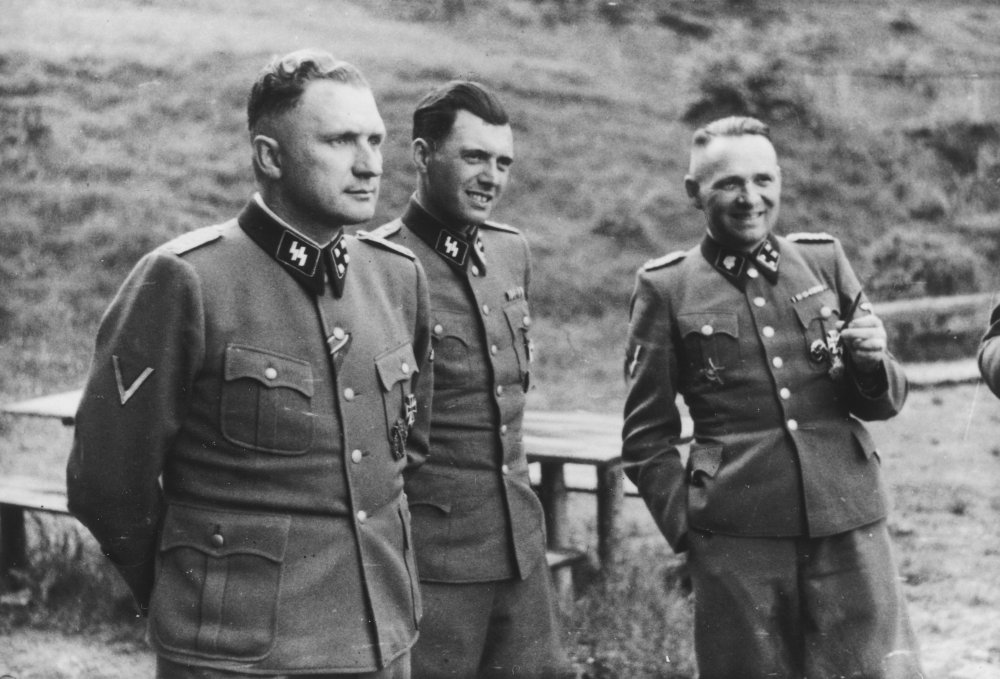 When the infamous Nazi doctor Josef Mengele (center in photo) was posted to Auschwitz in early 1943, what was he the chief physician of?