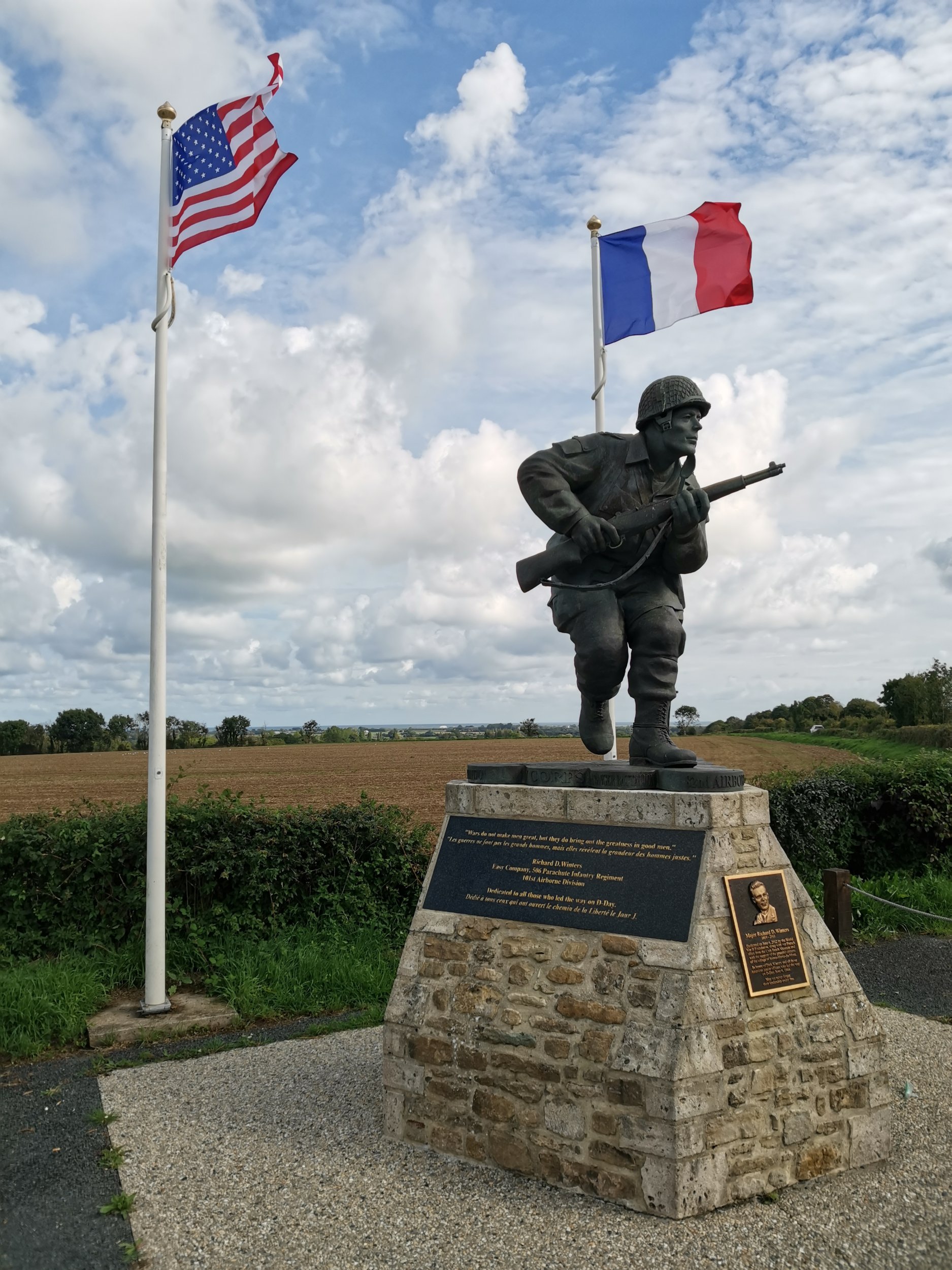 There is a statue of Dick Winters, the famous commander of Easy Company, 2nd Battalion, 506th Parachute Infantry Regiment, 101st Airborne Division, in the vicinity of the Normandy town of Sainte-Marie-du-Mont. Who or what is the statue dedicated to?
