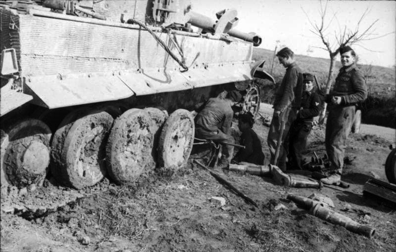 Why did the Tiger tank (and several others) use a complex system of interleaved roadwheels?