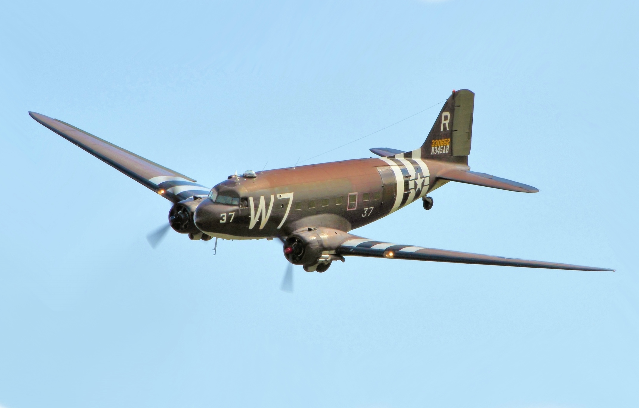 What was the AC-47, a modification of the C-47 transport aircraft that saw heavy use in World War II? (Photo depicts the regular C-47.)