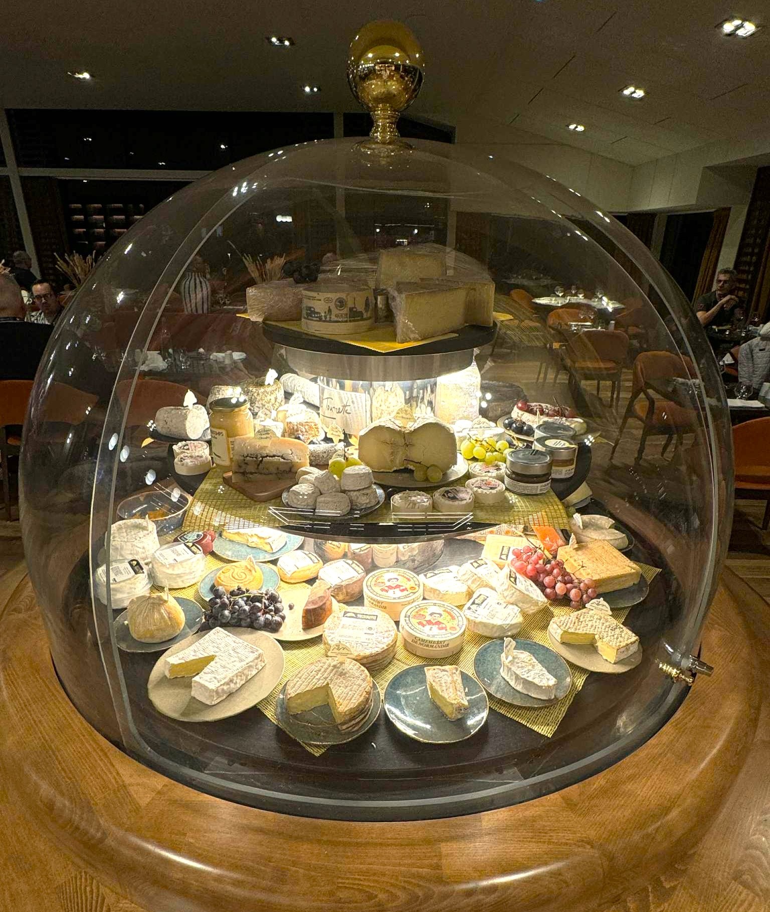 Which famous Normandy cheese hails from a town very close to Vimoutiers, which itself is famous for the abandoned Tiger II tank standing nearby?