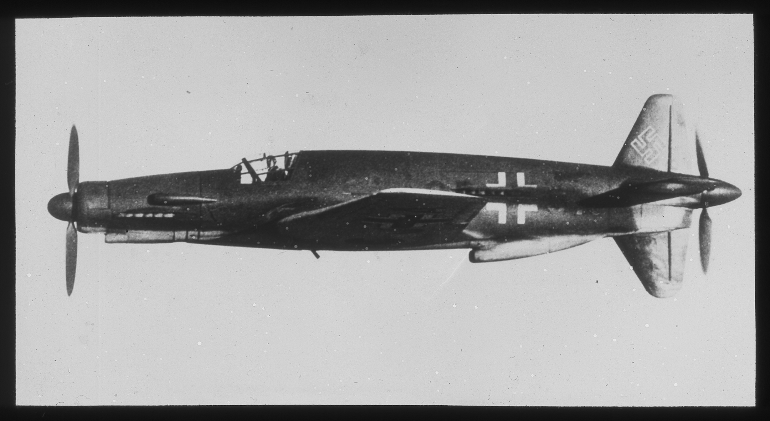 Can you identify this World War II-era German warplane with its distinctive push-pull propeller configuration?