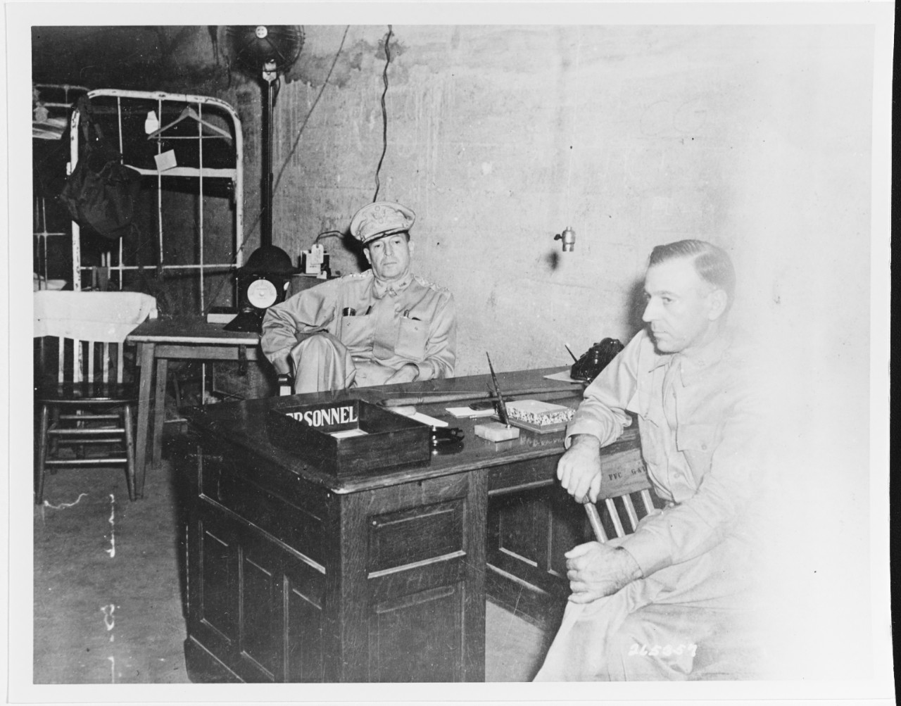 From which Philippine island did General MacArthur escape on March 11, 1942, leaving the rest of the defenders to their fate?