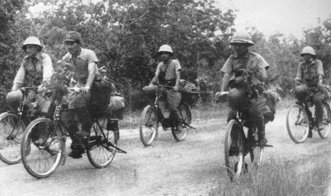 Japanese bicycle troops famously captured what Allied stronghold during World War II?