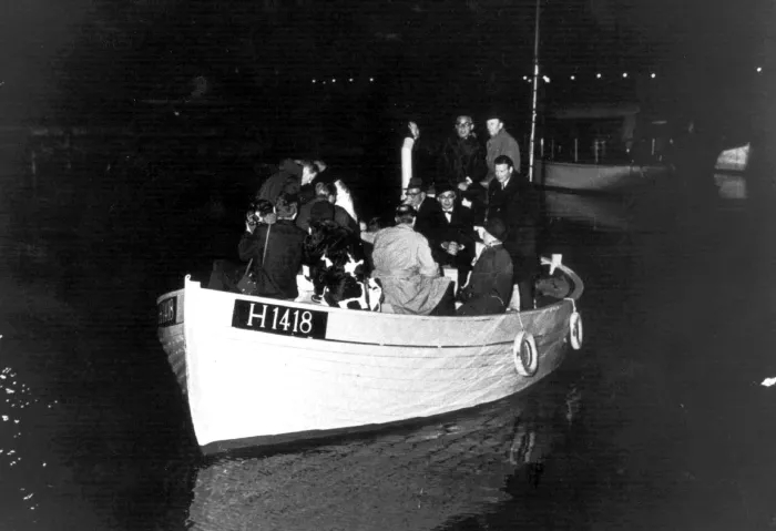 Which German-occupied country managed to evacuate over 90% of its Jewish population to safety before they could be arrested by the Nazis?