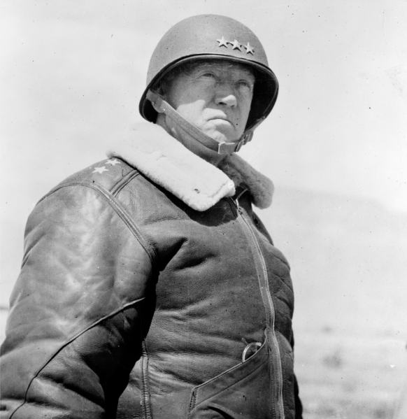 During the Battle of the Bulge, General George S. Patton's unexpectedly rapid advance saved thousands of Airborne troops who were surrounded in which strategically important town?