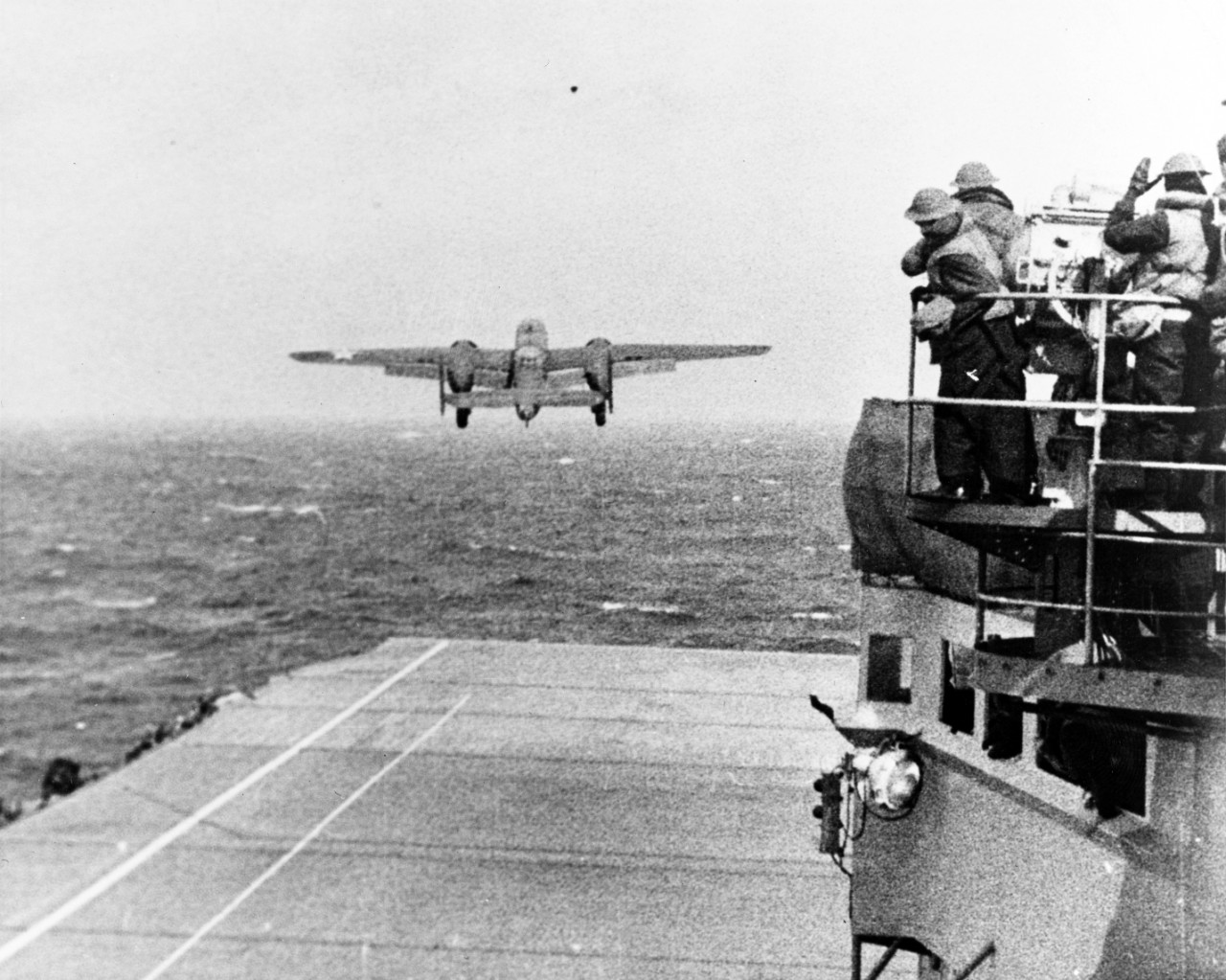 The B-25 bombers used for the Doolittle Raid on Tokyo had to be modified to give them better protection against Japanese fighters. What was this modification?