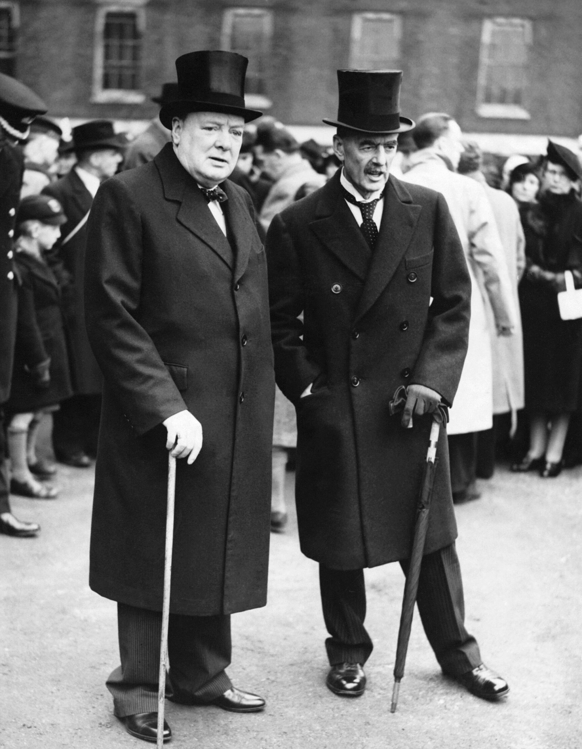 In May 1940, British Prime Minister Neville Chamberlain resigned and was replaced by Winston Churchill after a momentous debate in Parliament. What was the topic of this debate?