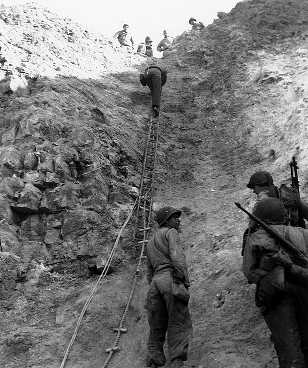 Why did U.S. Army Rangers have to climb the 110 ft. promontory of Pointe du Hoc during the landings?